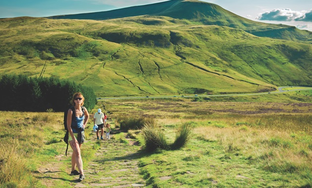 people walking in countryside