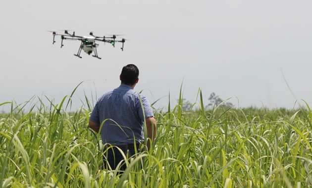 A drone flying over a farm