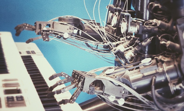 Robot hands playing piano