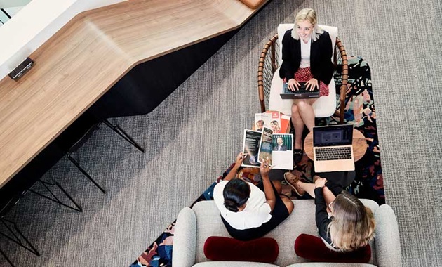 Murdoch students working in an office environment