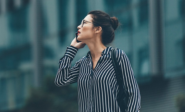 Young business woman on phone