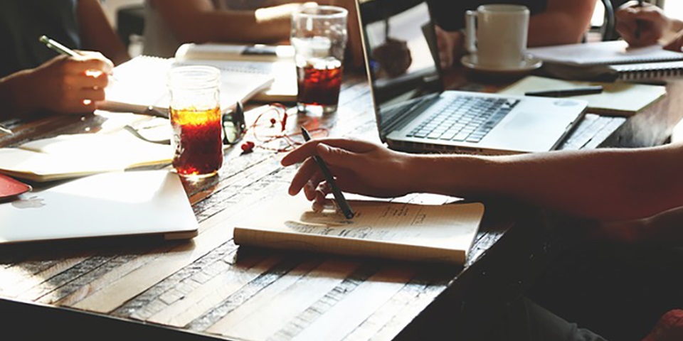 Business jobs2 Young professionals around a table