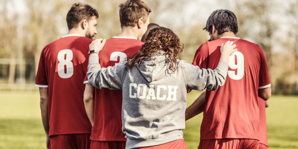 Coach with players