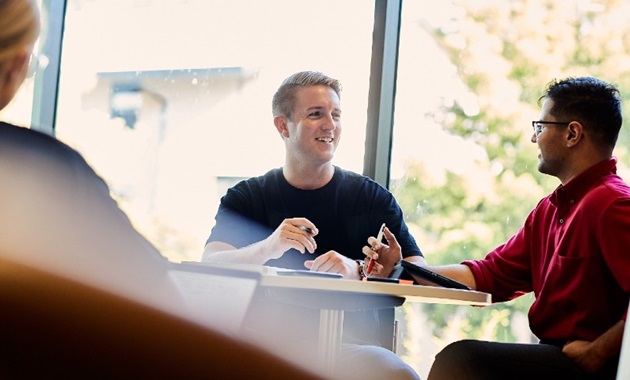 Business coach and student having a conversation