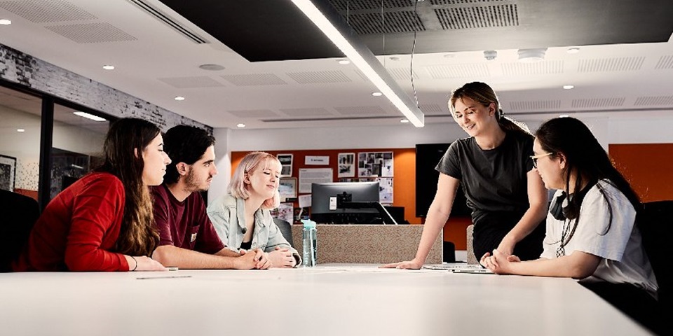 Creative_Job_860x480_v2 Murdoch students chatting around a table.