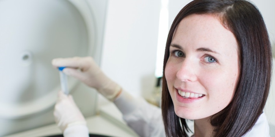 Dr Belinda Brown working in a lab