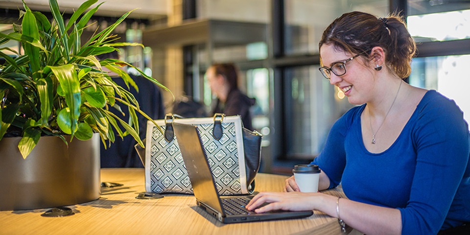 Erin Horrigan Feature Image Erin Horrigan working on laptop at Murdoch University