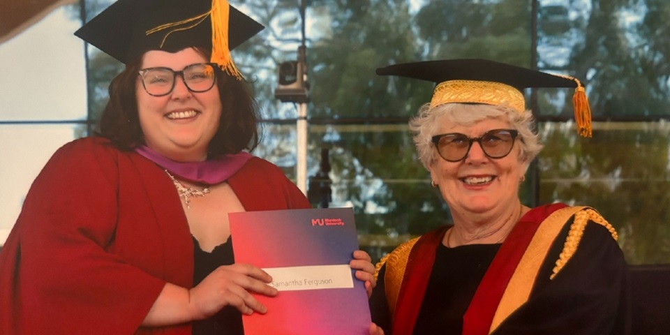 Gail McGowan awarding degree to Murdoch student Samantha Ferguson