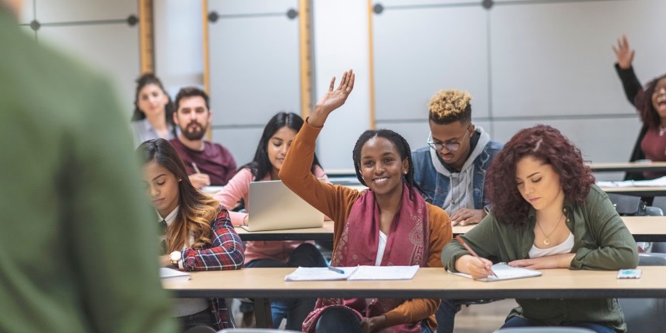 GettyImages-1162863893 860x480 FEATURE Class of students asking their teacher questions