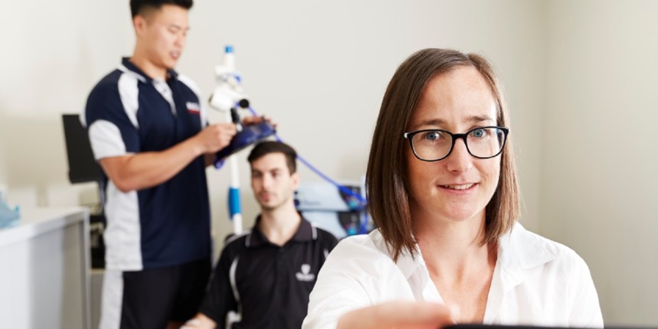 Students and their professor testing brain function