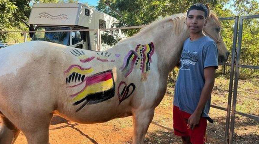 Indigenous boy with horse