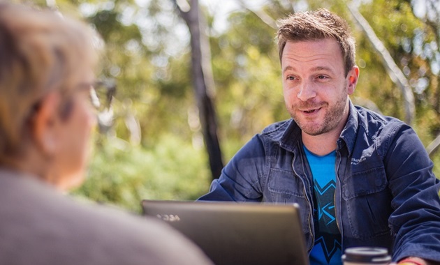 James Ingham talks to a classmate at Murdoch University cafe