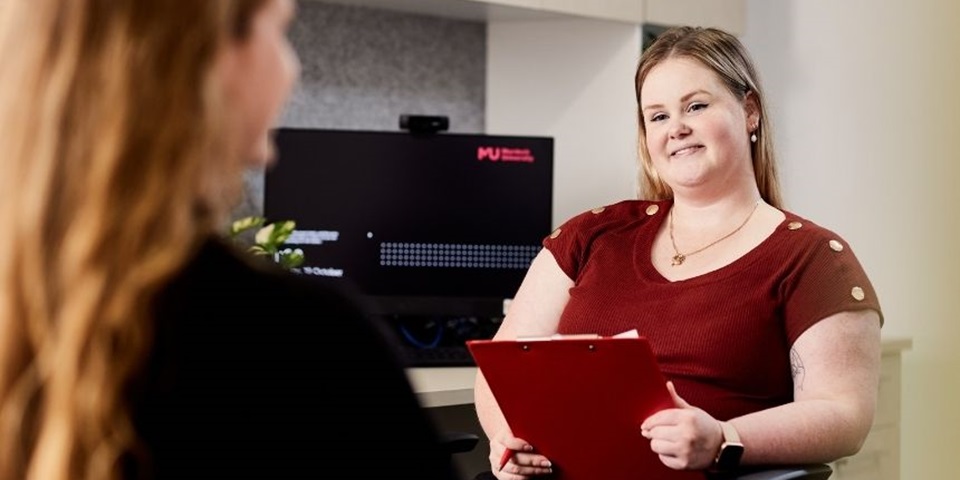 Jay feature image 860 x 480 px Student counsellor smiles at client