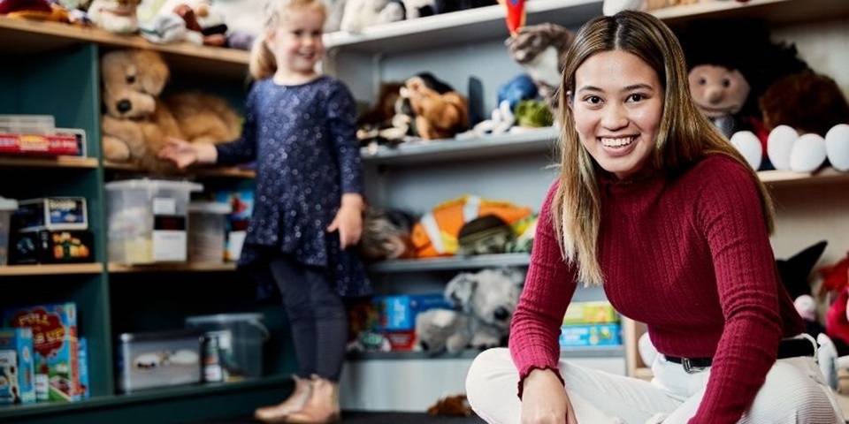 Jaztine Feature image 860 x 480 px Child and student smile to camera in a classroom
