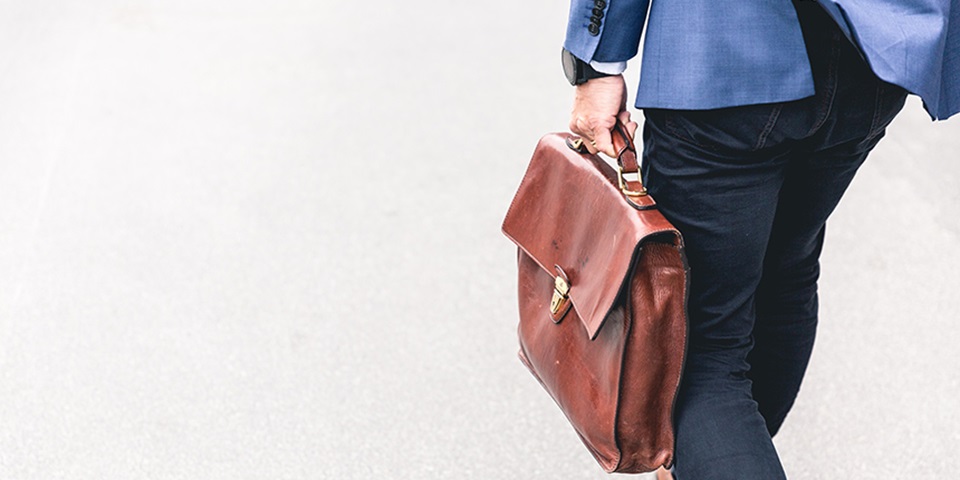 Man carrying briefcase to work Man carrying briefcase to work