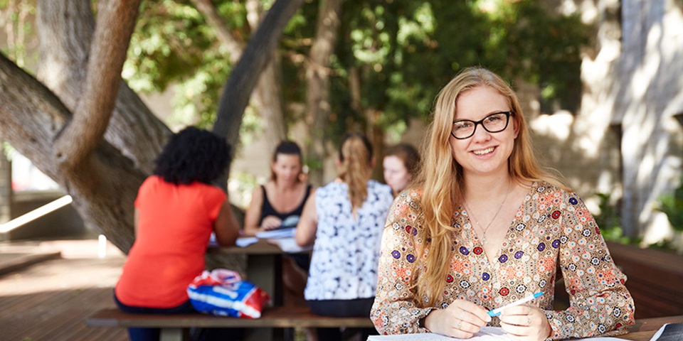 marketing student studying outdoors marketing student studying outdoors