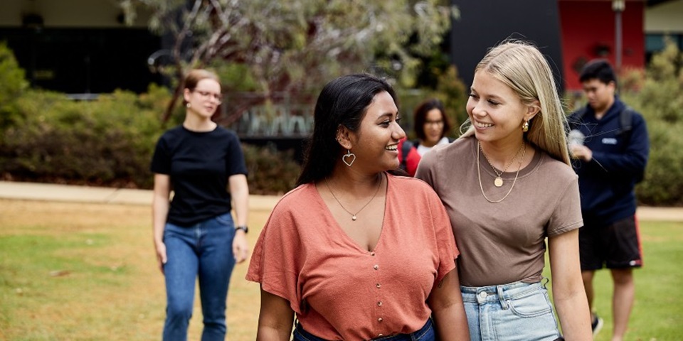 Natalie_feature Murdoch student Natalie walking in Bush Court