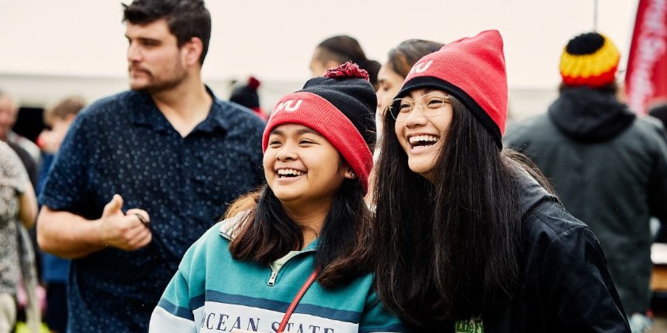 Open Day Feature 22 Two students wearing Murdoch Uni beanies smiling off camera