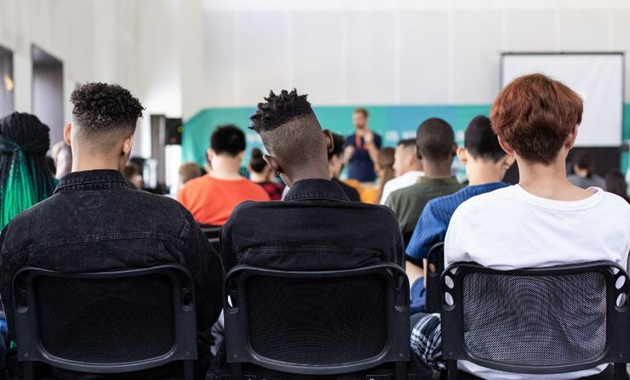 Students listening to a lecture.