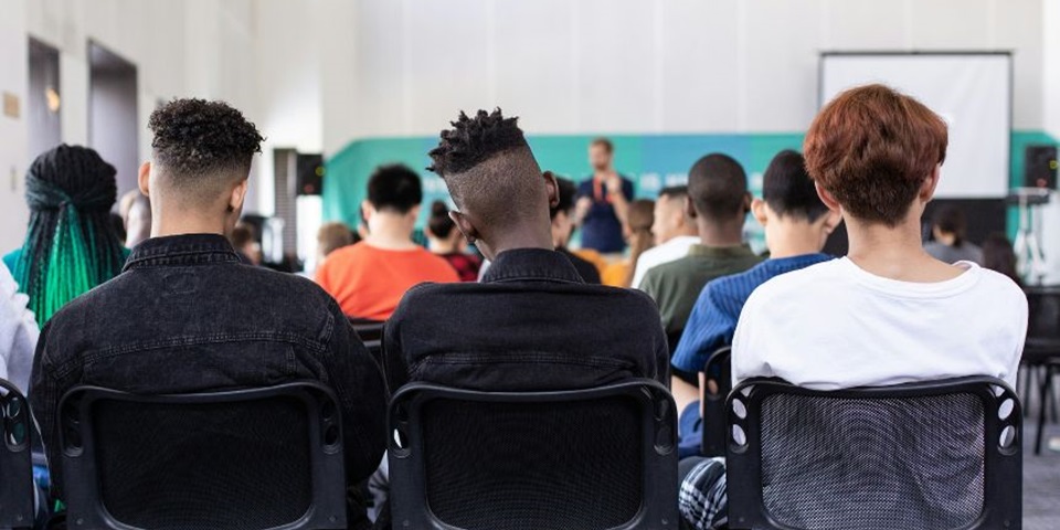Students listening to a lecture.