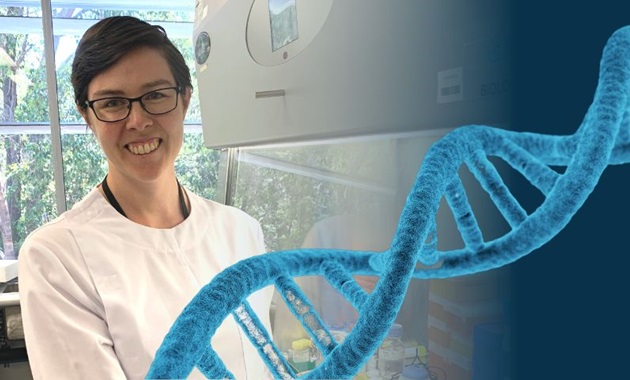 White female scientist wearing white lab coat