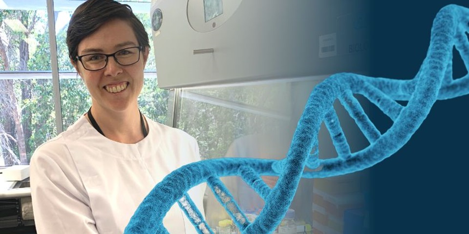 White female scientist wearing white lab coat