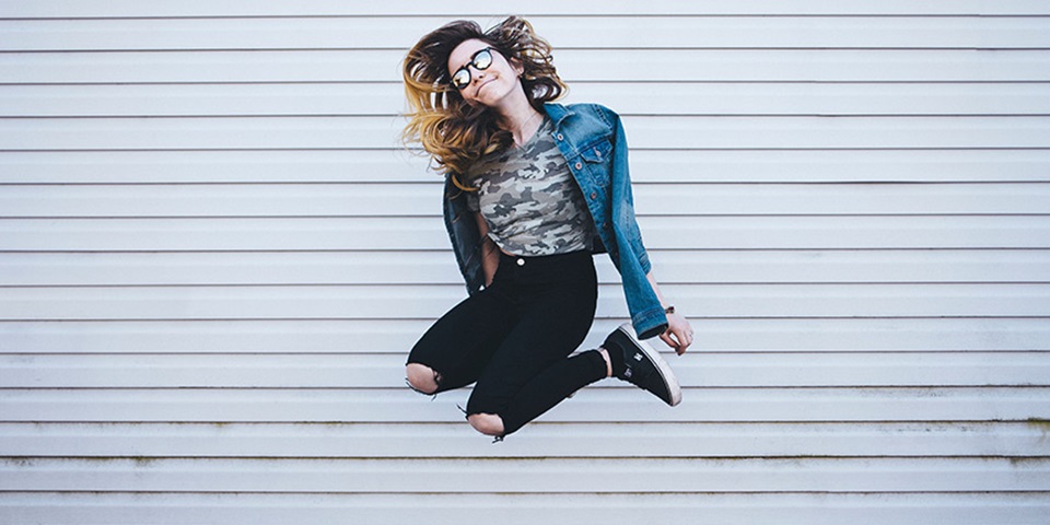 Scholarships-860x480 Girl jumping excitedly