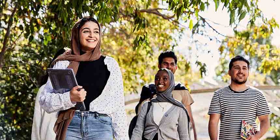SocialCultural_860x480 Group of students walking on campus