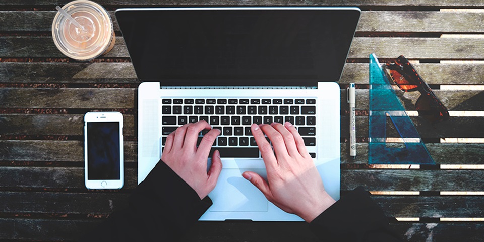 Study smart feature Bird's eye view of person using a laptop