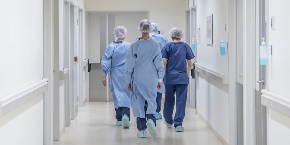 Surgeons walking into theatre