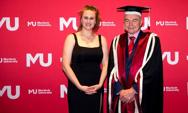 Student award winner Brianna Jane Hill, a white female with Vice Chancellor of Murdoch University Professor Andrew Deeks,  a white male wearing full university regalia