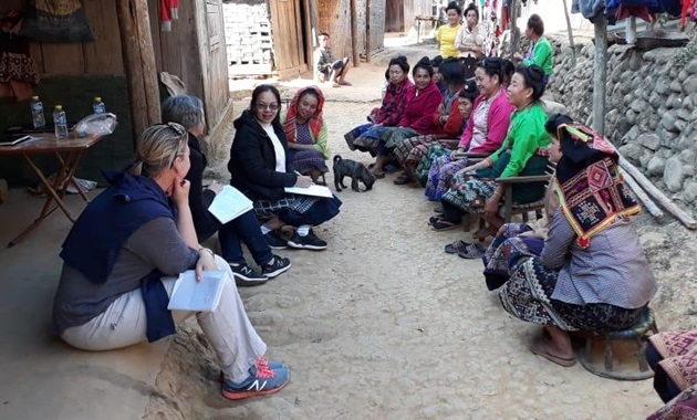 Dr Amanda Ash consulting with villages in Laos