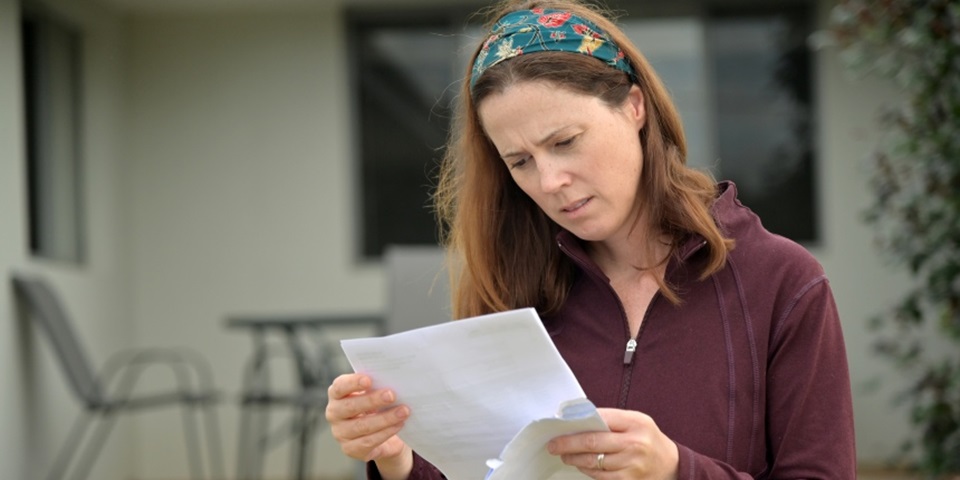 Woman with paper